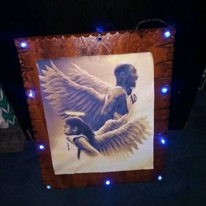 Wooden plaque with lights.